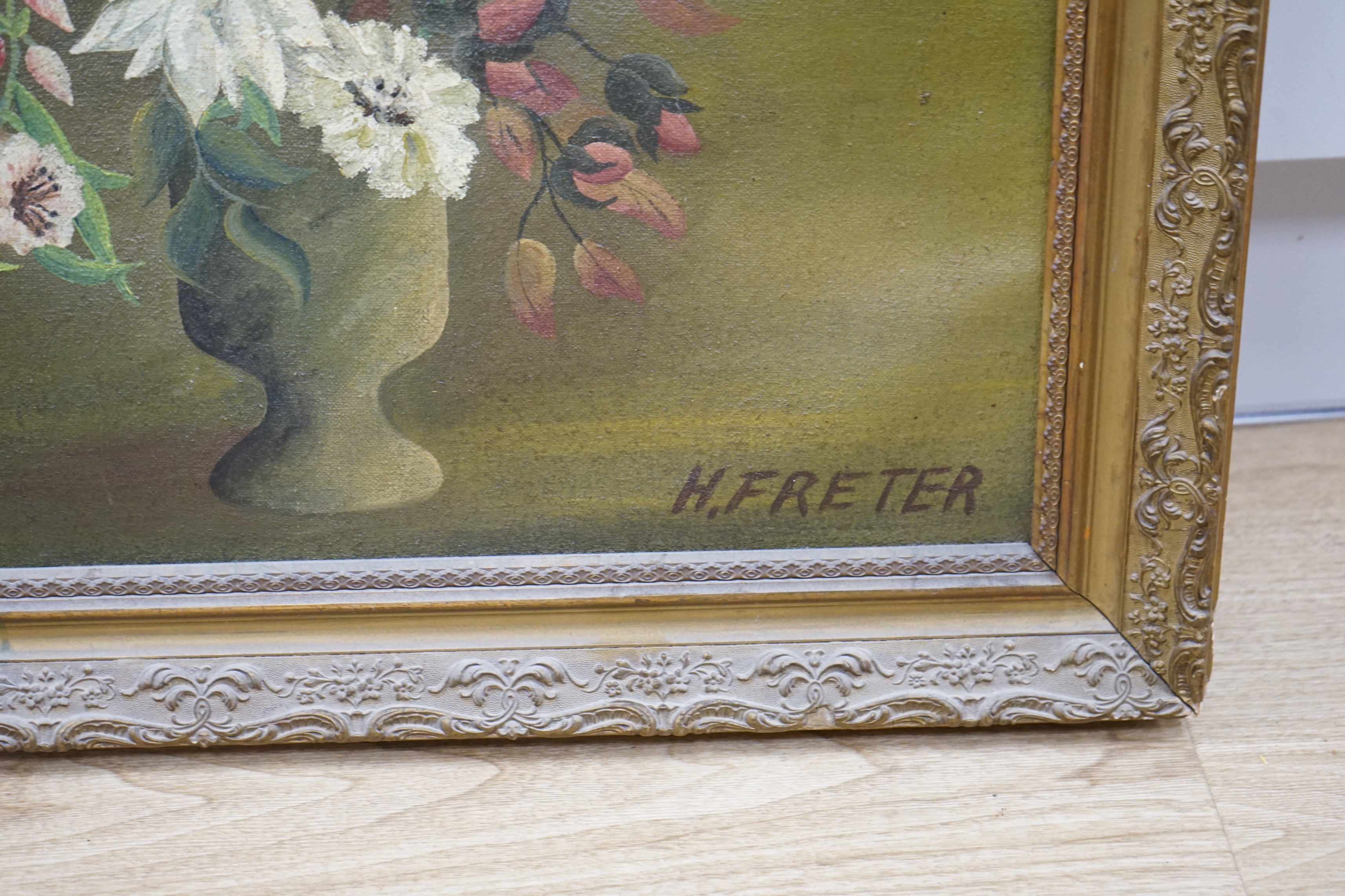 H. Freter, oil on canvas, Still life of flowers in a vase, signed, 60 x 50cm